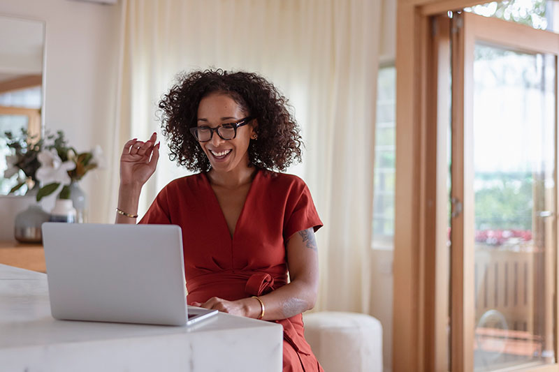 Young woman telecommuting from home
