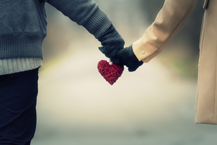 couple holding hands